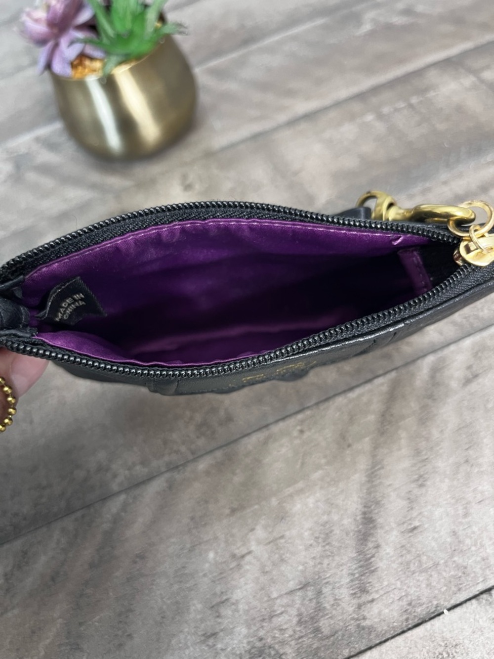 Madison black pebbled leather wristlet featuring gold-tone hardware - Picture 5 of 5